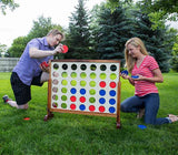 Playing Connect 4 in a Row Yard Game